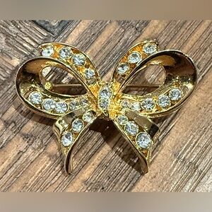 LIA Gold Tone Bow Rhinestone Brooch